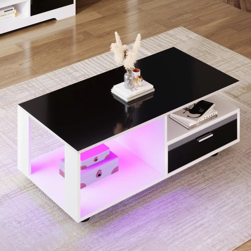 Modern LED coffee table with black glossy top with two drawers, color combination black and white