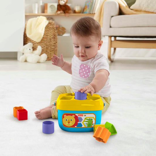 Fisher-Price FFC84 Baby's First Building Blocks Shape Sorting Game with Toy Cube and Storage Bucket for Ages 6 Months and up, Single