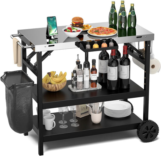 KOMFOTTEU Foldable Barbecue Trolley, Grill Table with Stainless Steel Worktop, Outdoor Trolley with 2 Wheels, Serving Trolley Grill Trolley with Adjustable Shelf, Mobile Phone Holder & Towel Holder,