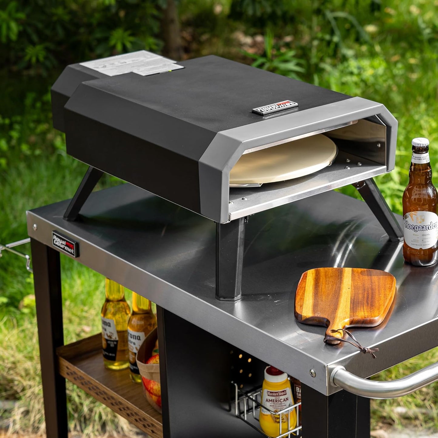 Royal Gourmet Grill Table with 85 x 50 cm Stainless Steel Plate, 3 Tier Grill Trolley for Table Grill and Pizza Ovens, Trolley with Handles, Bin Bag Holder & Storage Shelves, Easy to Clean and Movable