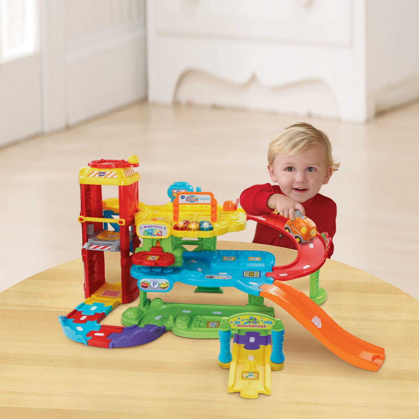 VTech Baby Flitzer - Parking Garage - Interactive Toy with Tow Truck, Lift, Slide, Gas Station and Much More - For Children Aged 1-5 Years
