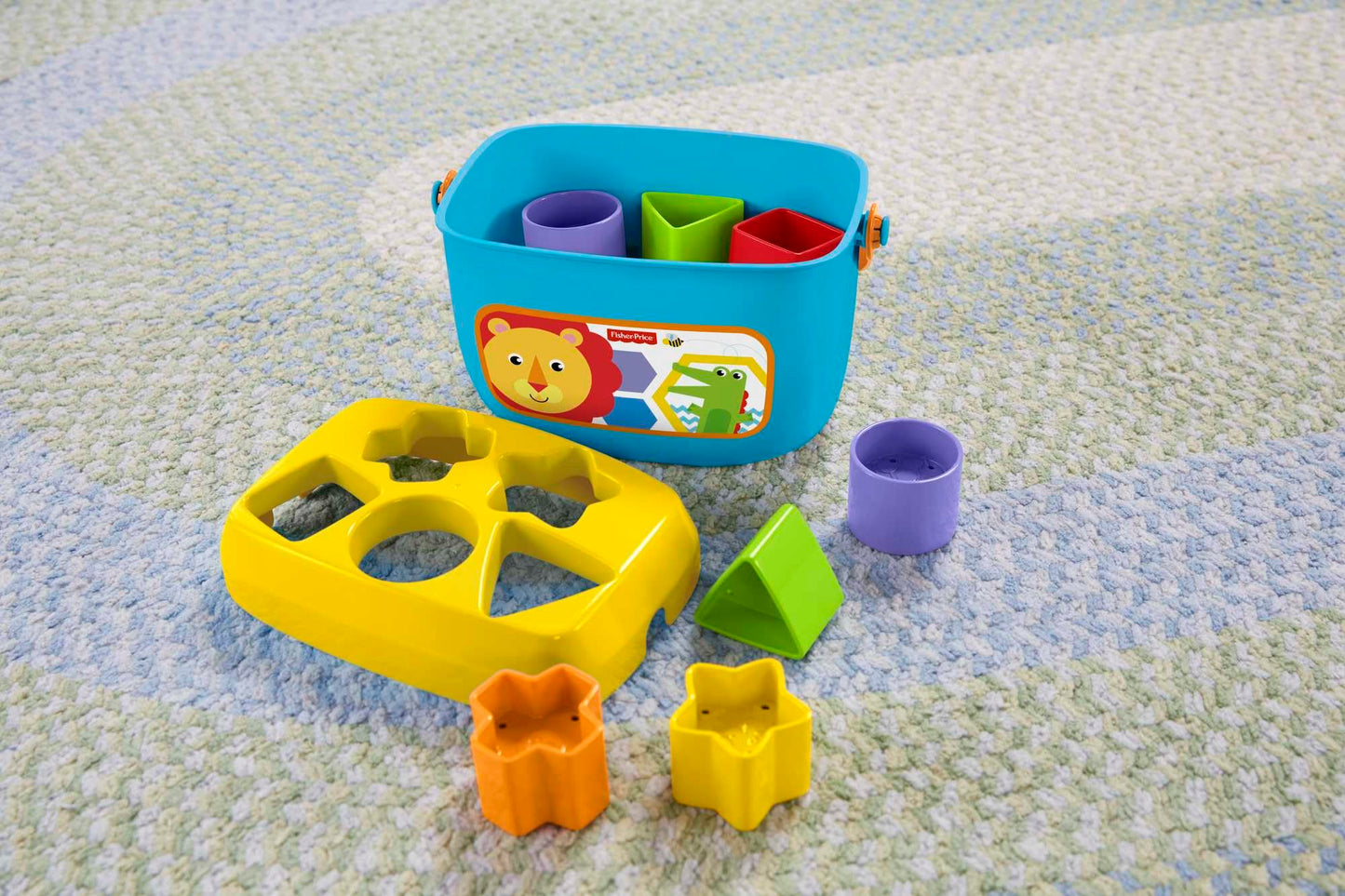 Fisher-Price FFC84 Baby's First Building Blocks Shape Sorting Game with Toy Cube and Storage Bucket for Ages 6 Months and up, Single
